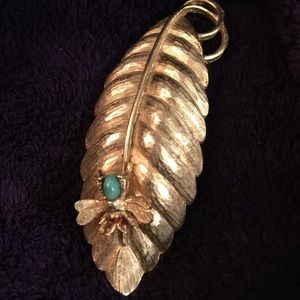 Vintage gold leaf brooch adorned with jeweled fly